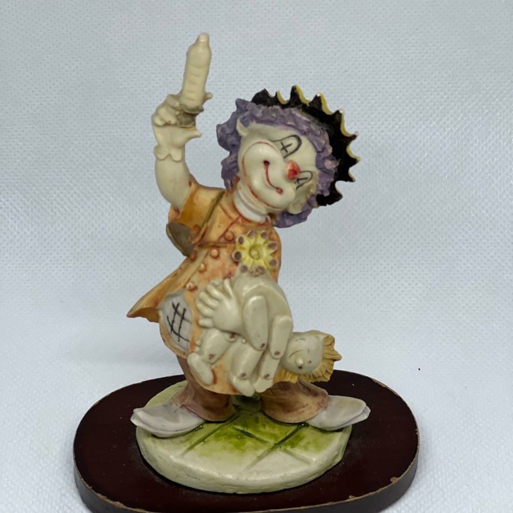 Porcelain Clown on Wooden Base, 4.5' tall